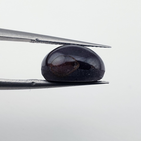 Granat gwiaździsty kaboszon 11x9 mm nr 322