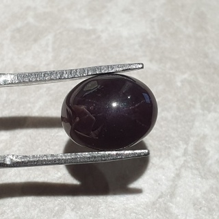 Granat gwiaździsty kaboszon 11x9 mm nr 328