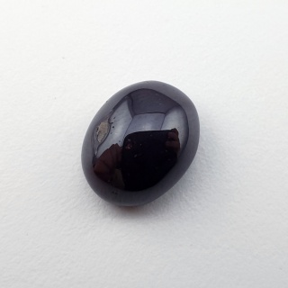 Granat gwiaździsty kaboszon 11x9 mm nr 328