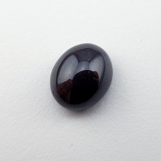 Granat gwiaździsty kaboszon 11x9 mm nr 330