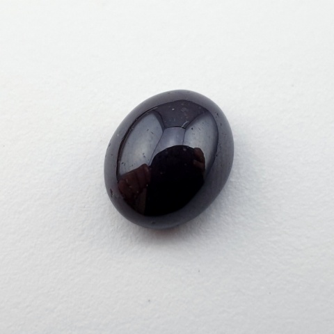 Granat gwiaździsty kaboszon 11x9 mm nr 330