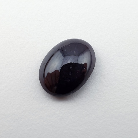 Granat gwiaździsty kaboszon 11x9 mm nr 332