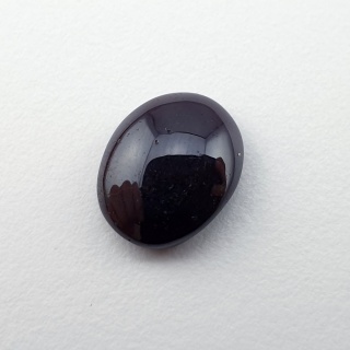 Granat gwiaździsty kaboszon 11x9 mm nr 333