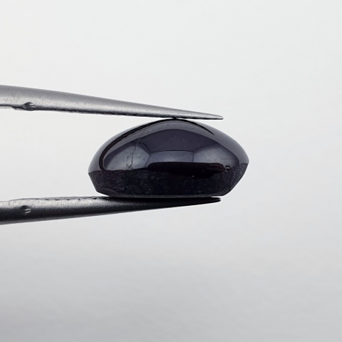 Granat gwiaździsty kaboszon 11x9 mm nr 335