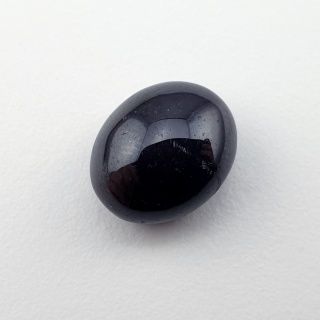 Granat gwiaździsty kaboszon 12x10 mm nr 139