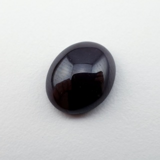 Granat gwiaździsty kaboszon 12x10 mm nr 143