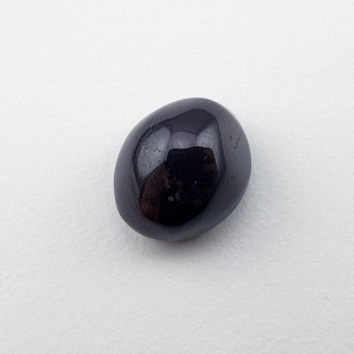 Granat gwiaździsty kaboszon 12x10 mm nr 223