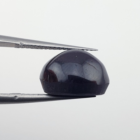 Granat gwiaździsty kaboszon 12x10 mm nr 223