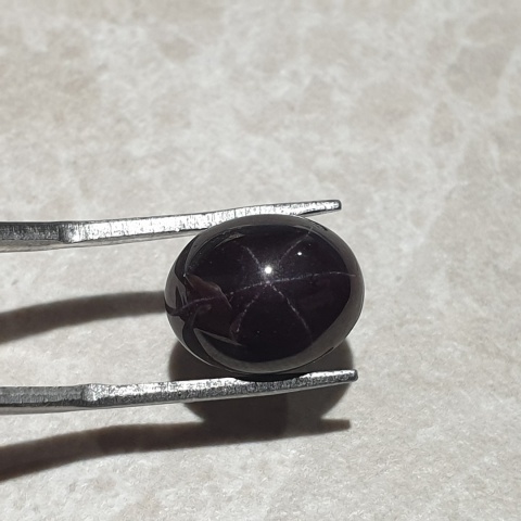 Granat gwiaździsty kaboszon 12x10 mm nr 263