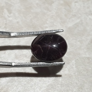 Granat gwiaździsty kaboszon 12x10 mm nr 294