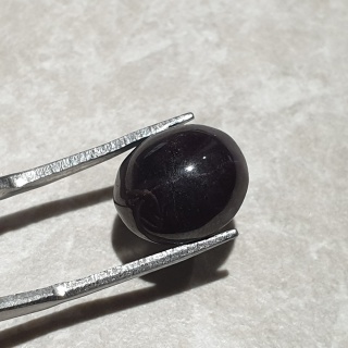 Granat gwiaździsty kaboszon 12x10 mm nr 306