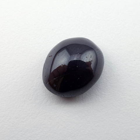 Granat gwiaździsty kaboszon 12x10 mm nr 309