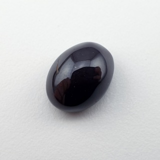 Granat gwiaździsty kaboszon 12x10 mm nr 313