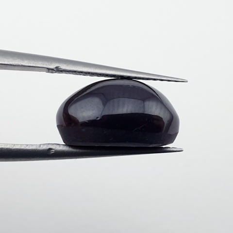 Granat gwiaździsty kaboszon 12x10 mm nr 313