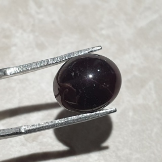 Granat gwiaździsty kaboszon 12x10 mm nr 315