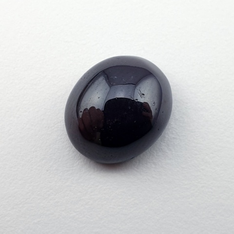 Granat gwiaździsty kaboszon 12x10 mm nr 315