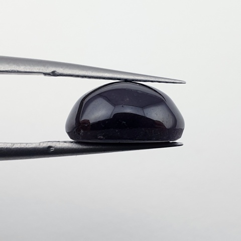 Granat gwiaździsty kaboszon 12x10 mm nr 315