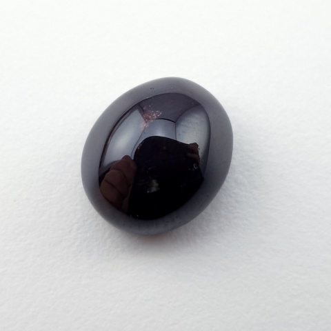 Granat gwiaździsty kaboszon 12x10 mm nr 318