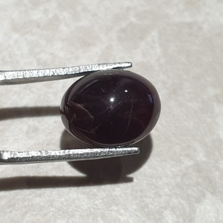 Granat gwiaździsty kaboszon 12x10 mm nr 320