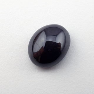 Granat gwiaździsty kaboszon 12x10 mm nr 320