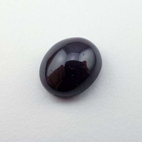 Granat gwiaździsty kaboszon 12x10 mm nr 323