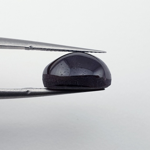 Granat gwiaździsty kaboszon 12x10 mm nr 323