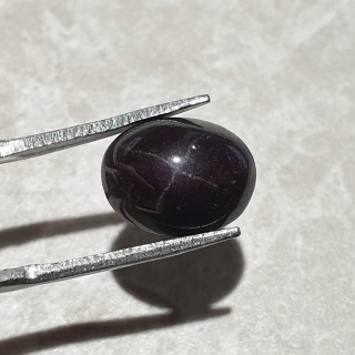 Granat gwiaździsty kaboszon 12x10 mm nr 325