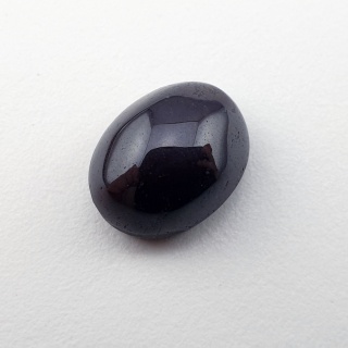 Granat gwiaździsty kaboszon 12x10 mm nr 325