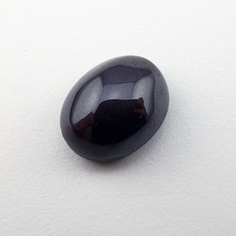 Granat gwiaździsty kaboszon 12x10 mm nr 325