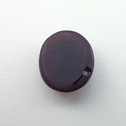 Granat gwiaździsty kaboszon 12x10 mm nr 331