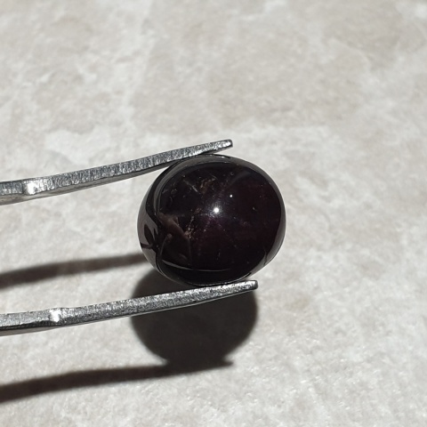 Granat gwiaździsty kaboszon 12x11 mm nr 197