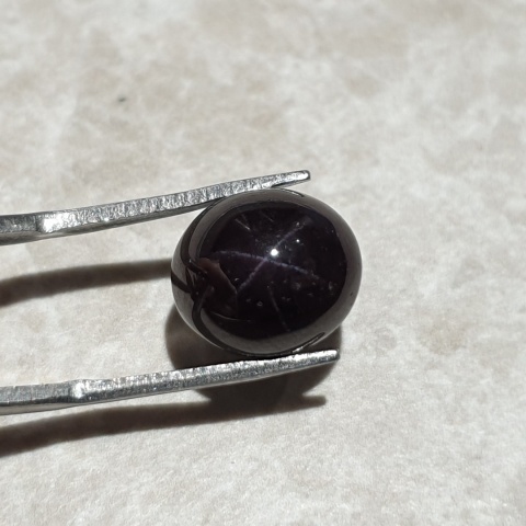 Granat gwiaździsty kaboszon 12x11 mm nr 215