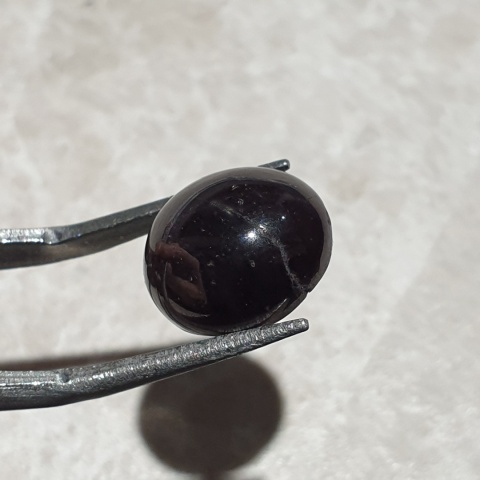 Granat gwiaździsty kaboszon 12x11 mm nr 219