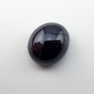 Granat gwiaździsty kaboszon 12x11 mm nr 219