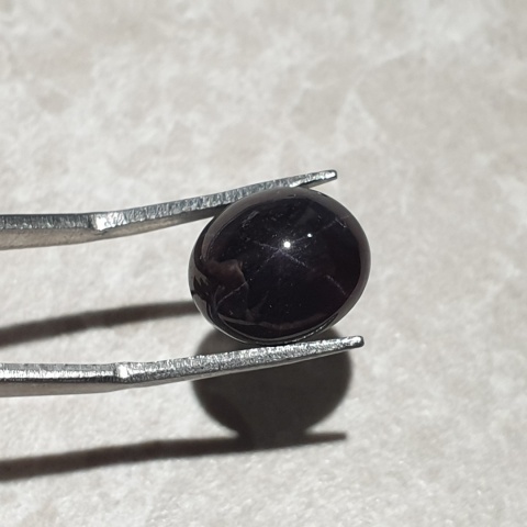 Granat gwiaździsty kaboszon 12x11 mm nr 244