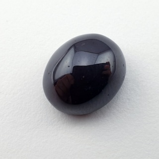 Granat gwiaździsty kaboszon 12x11 mm nr 303