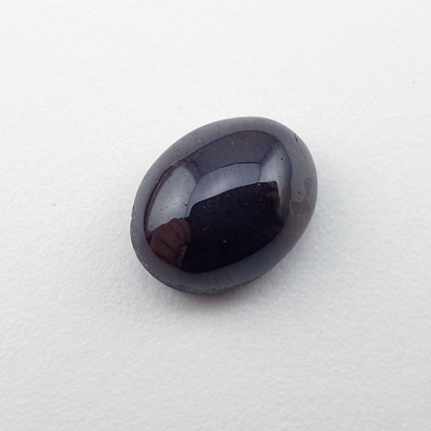 Granat gwiaździsty kaboszon 12x9 mm nr 157