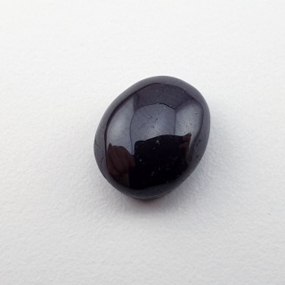 Granat gwiaździsty kaboszon 12x9 mm nr 214