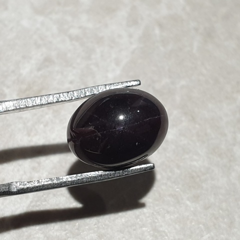 Granat gwiaździsty kaboszon 12x9 mm nr 262