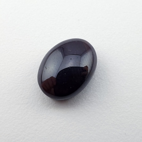 Granat gwiaździsty kaboszon 12x9 mm nr 329