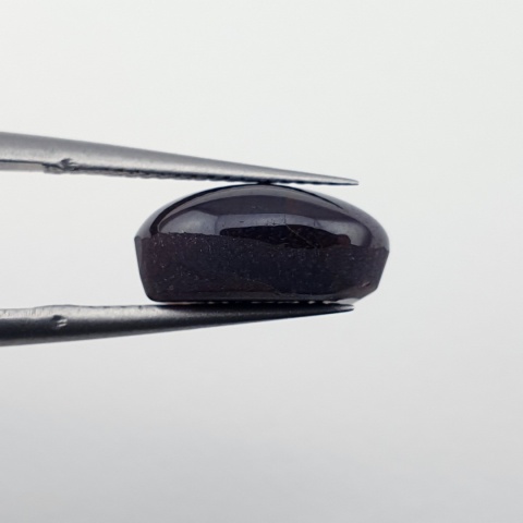 Granat gwiaździsty kaboszon 12x9 mm nr 329