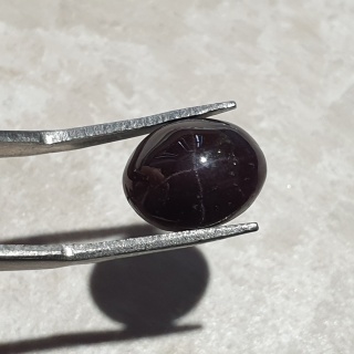 Granat gwiaździsty kaboszon 13x10 mm nr 174