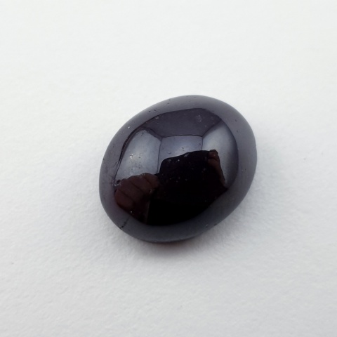 Granat gwiaździsty kaboszon 13x10 mm nr 174