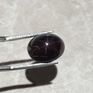 Granat gwiaździsty kaboszon 13x10 mm nr 195