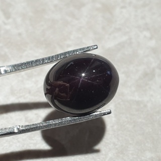 Granat gwiaździsty kaboszon 13x10 mm nr 297