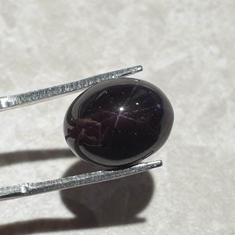 Granat gwiaździsty kaboszon 13x10 mm nr 297