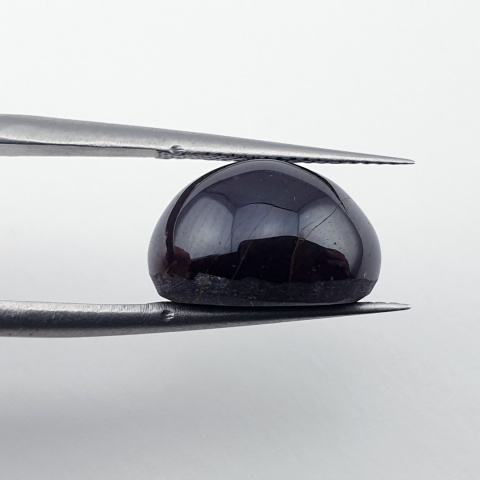 Granat gwiaździsty kaboszon 13x10 mm nr 297