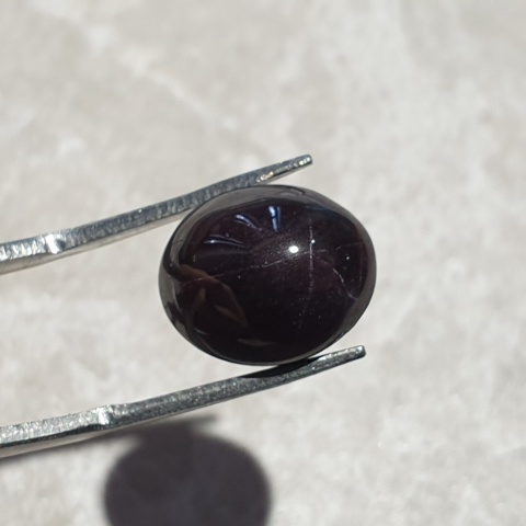 Granat gwiaździsty kaboszon 13x11 mm nr 164