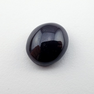 Granat gwiaździsty kaboszon 13x11 mm nr 282