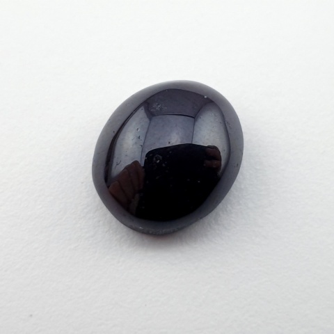 Granat gwiaździsty kaboszon 13x11 mm nr 282